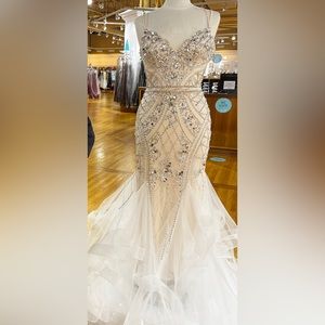 Beautiful Ivory prom dress size 0. Great condition only wore once.